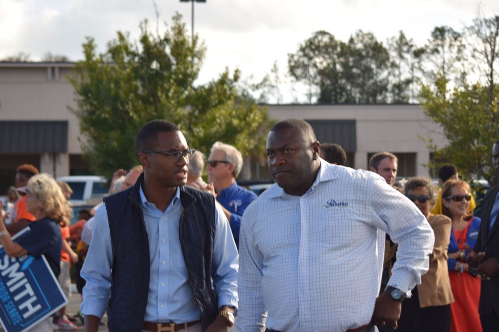 Mayor Hill works out details with Bill Clinton's advance team.