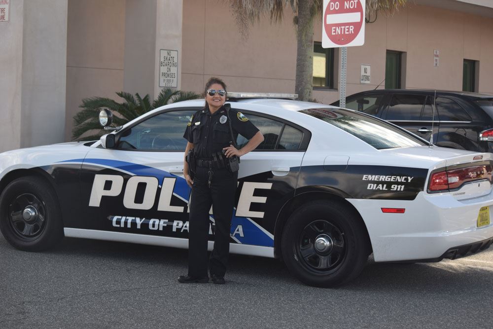 Officer Reeves providing support for former President Bill Clinton's arrival.